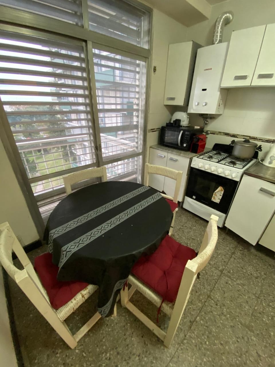 Kitchen or kitchenette, oven, toaster