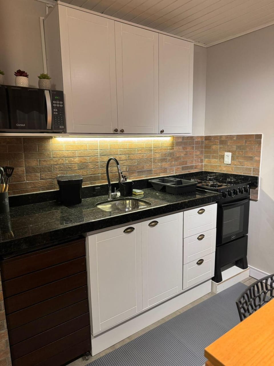 Kitchen or kitchenette, stove