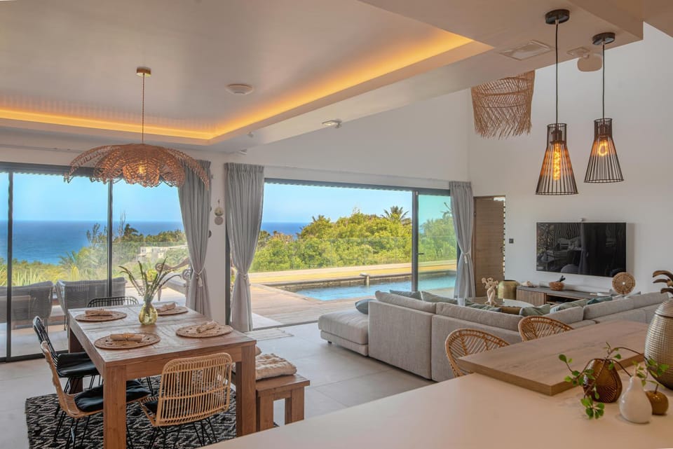 Communal lounge/ TV room, Natural landscape, View (from property/room), Living room, Pool view, Sea view