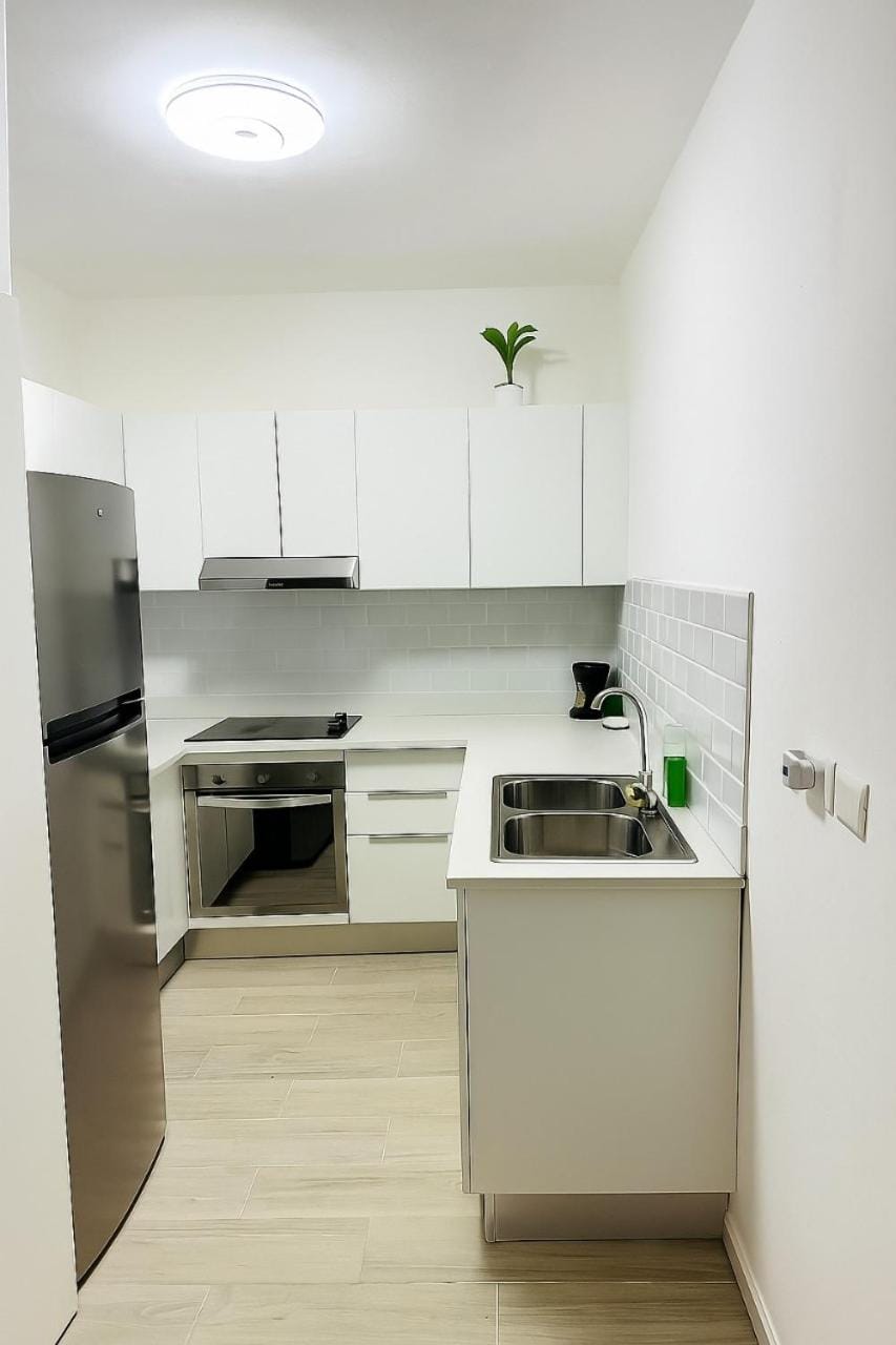 Kitchen or kitchenette, oven, stove