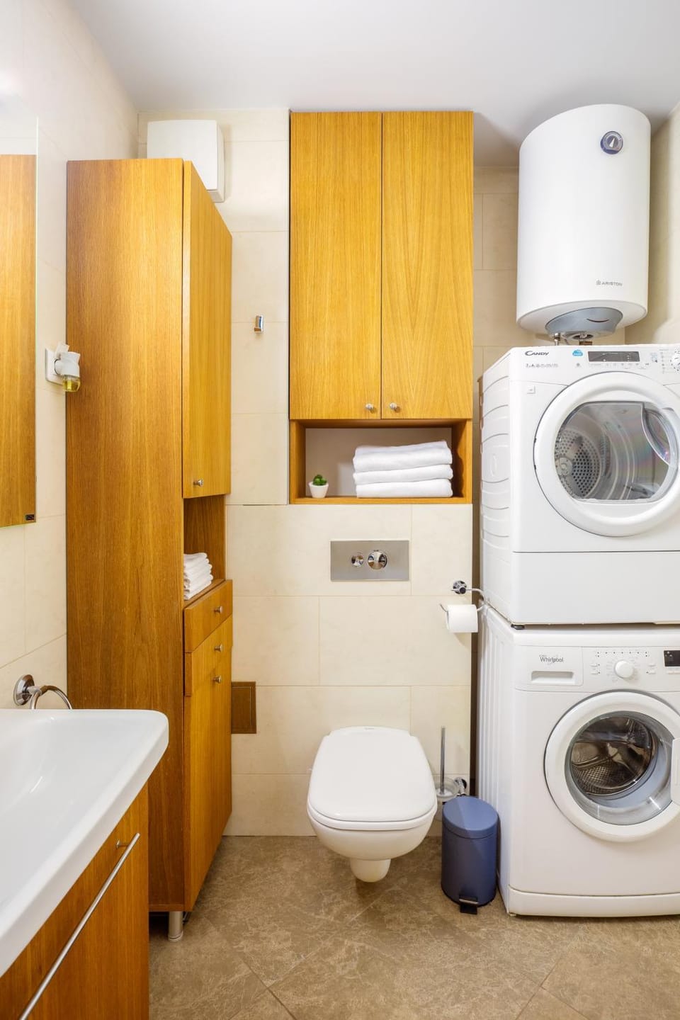 Toilet, towels, washing machine, dryer