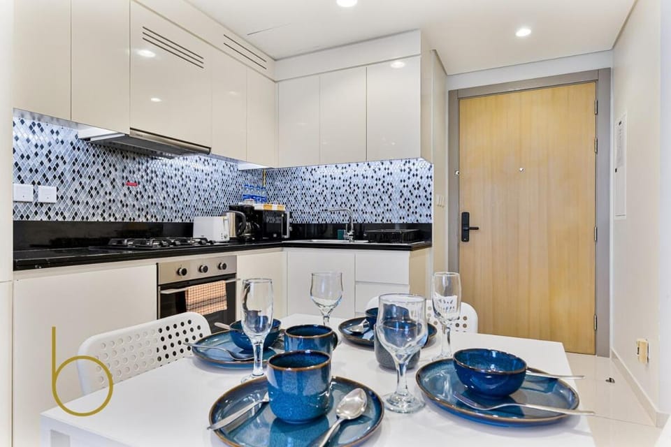 Kitchen or kitchenette, Dining area, dishwasher, stove, toaster