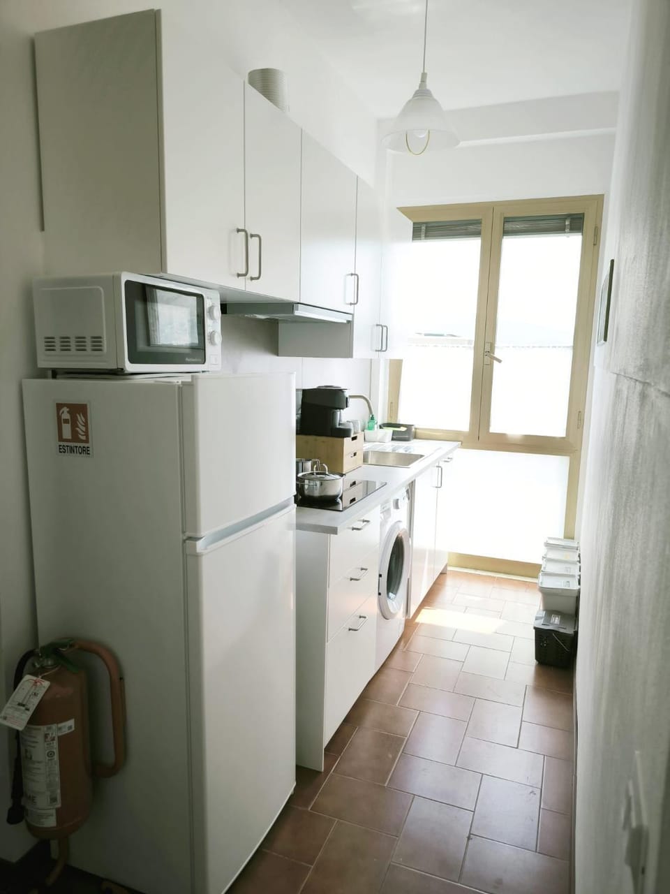 Coffee/tea facilities, Kitchen or kitchenette, dishwasher, microwave, stove, toaster, washing machine