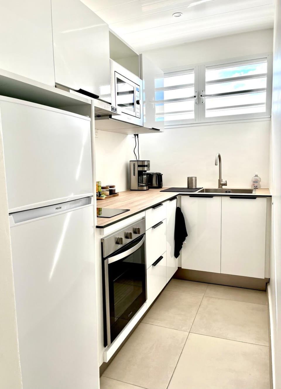 Kitchen or kitchenette, microwave, oven, stove, toaster