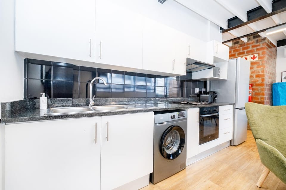 Kitchen or kitchenette, washing machine