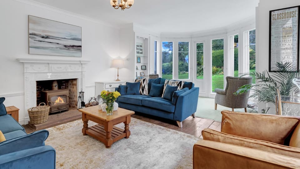 Living room, Seating area, Garden view, fireplace