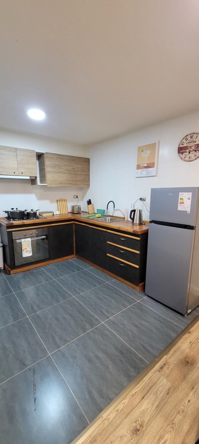 Kitchen or kitchenette, oven, stove