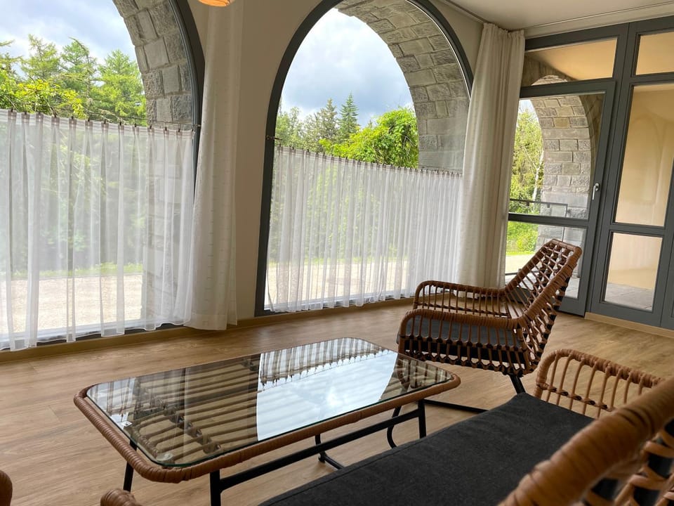 View (from property/room), Balcony/Terrace, Seating area, Garden view