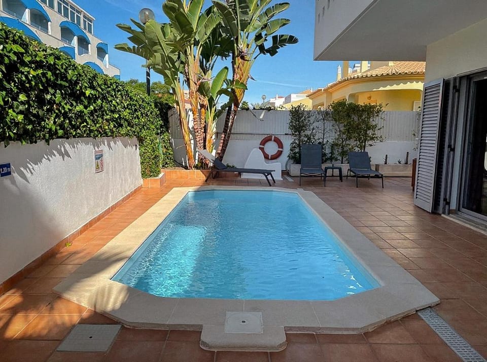 Patio, Day, Pool view, Swimming pool, sunbed