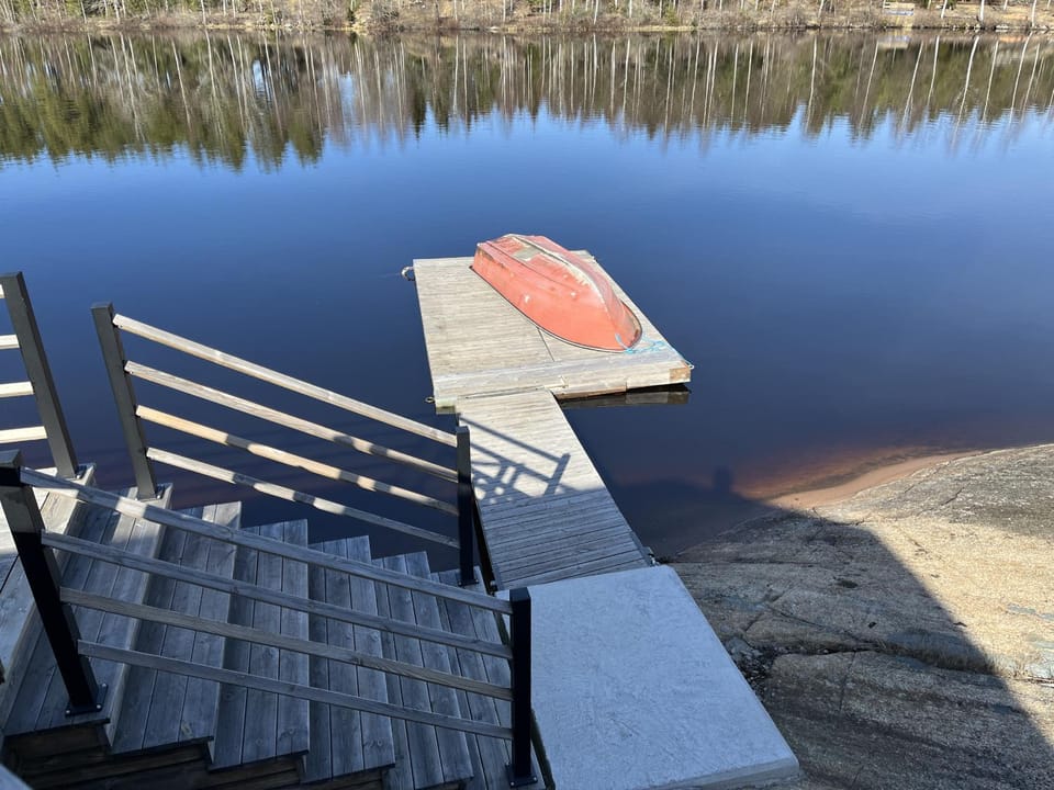 Newly built log cabin on a lakeside plot near Hultsfred Cabin in Kalmar County, Sweden