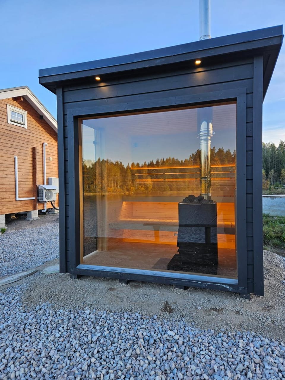 Newly built log cabin on a lakeside plot near Hultsfred Cabin in Kalmar County, Sweden