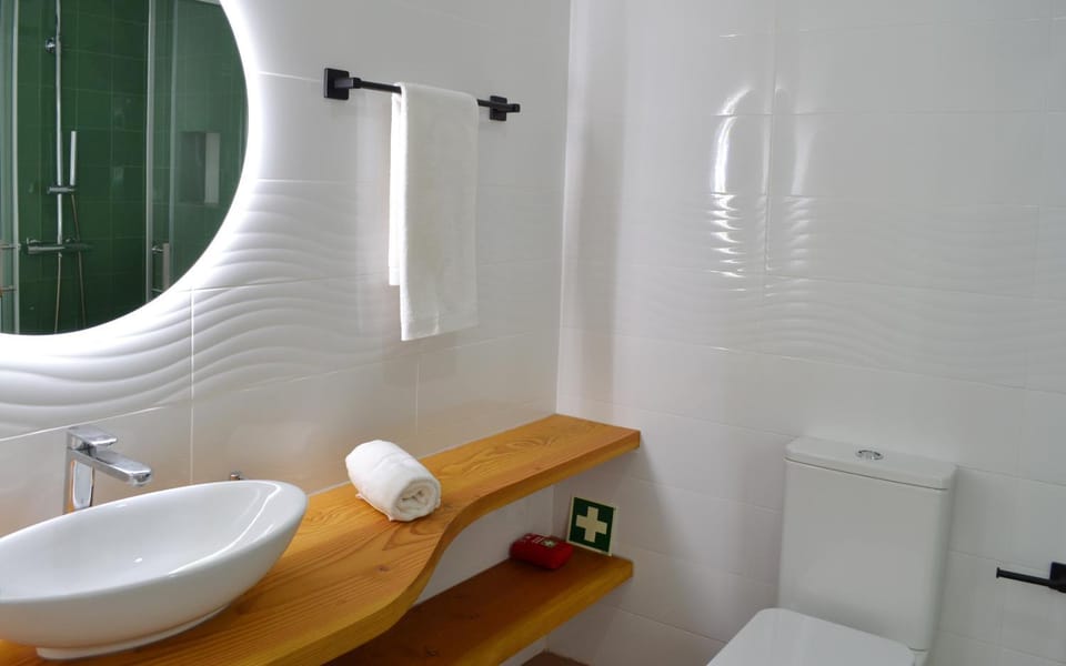 Shower, Toilet, Bathroom, hair dryier, towels