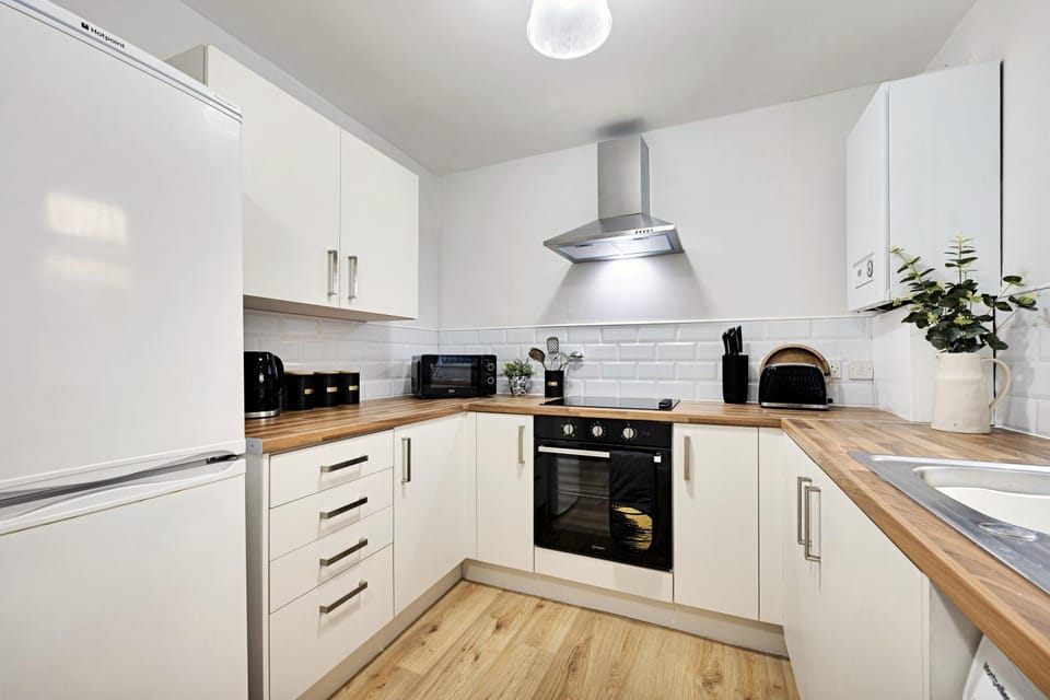 Kitchen or kitchenette, stove