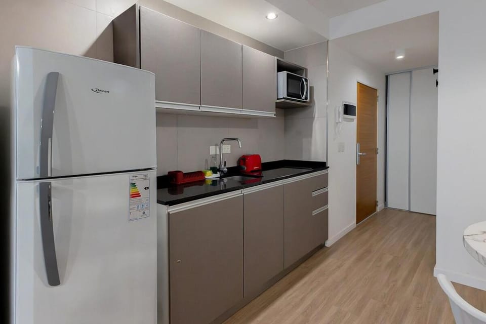 Kitchen or kitchenette, stove, toaster