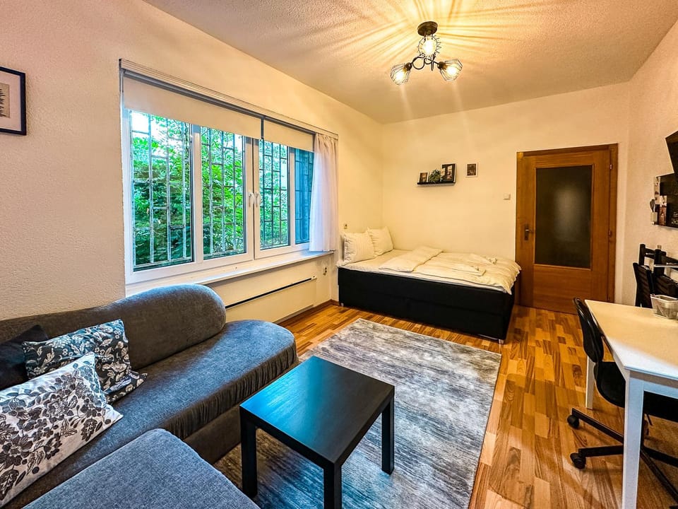 Bed, Living room, Seating area, Bedroom