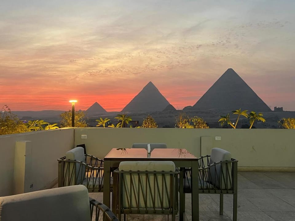 Patio, Nearby landmark, Restaurant/places to eat, Day, Natural landscape, View (from property/room), Balcony/Terrace, Dining area, Landmark view, Mountain view, Sunrise, Sunset