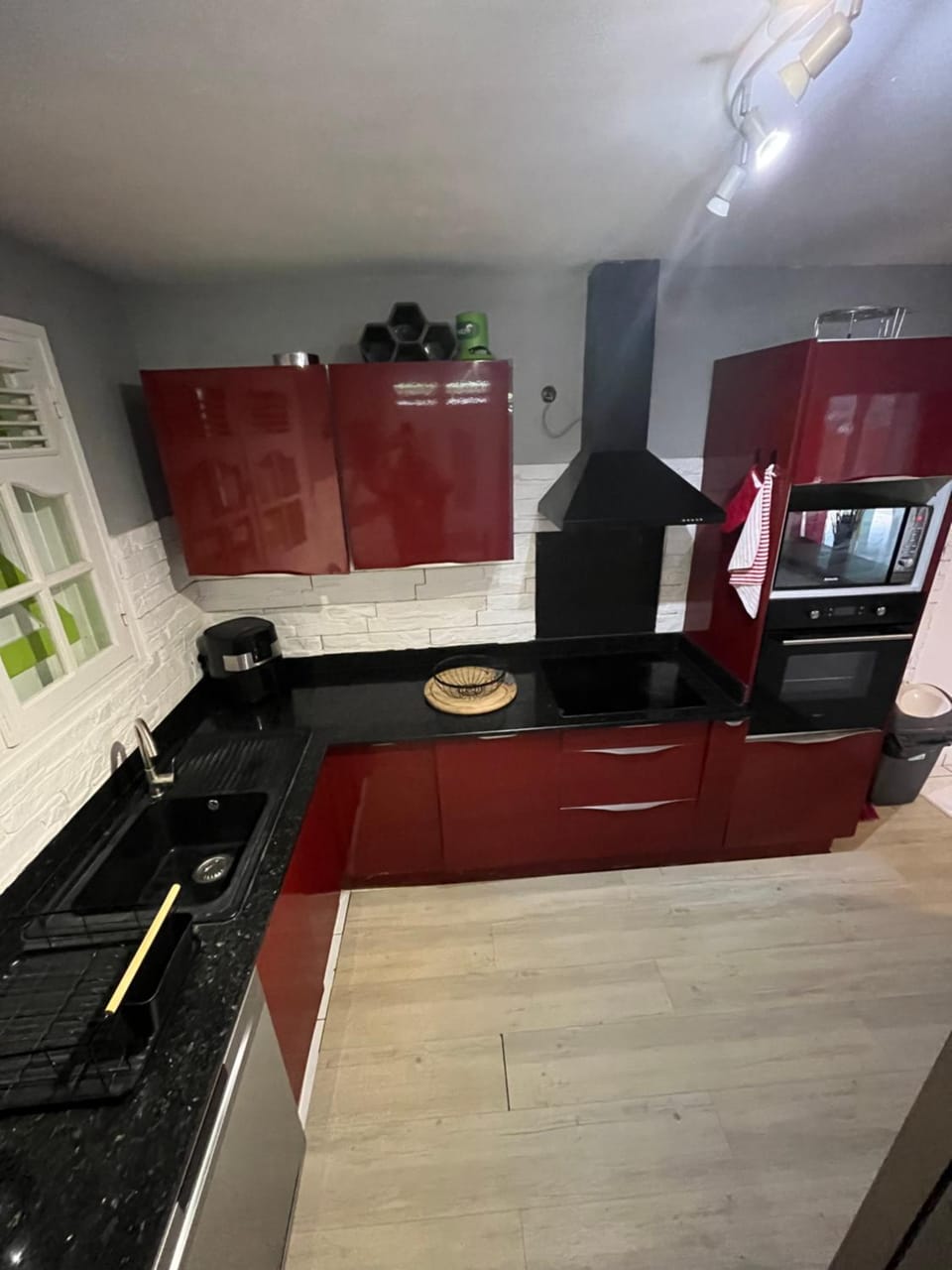 Kitchen or kitchenette, dishwasher, oven, stove, toaster