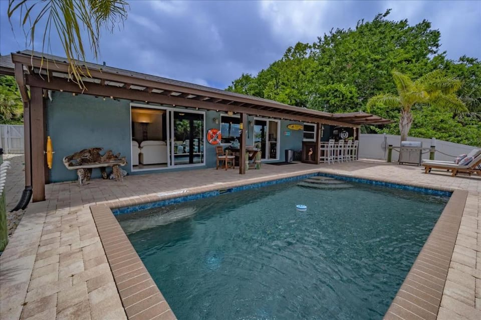 Waterfront Retreat with Pool Tiki Bar & Boat Dock House in Palm Coast