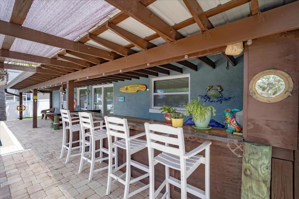 Waterfront Retreat with Pool Tiki Bar & Boat Dock House in Palm Coast