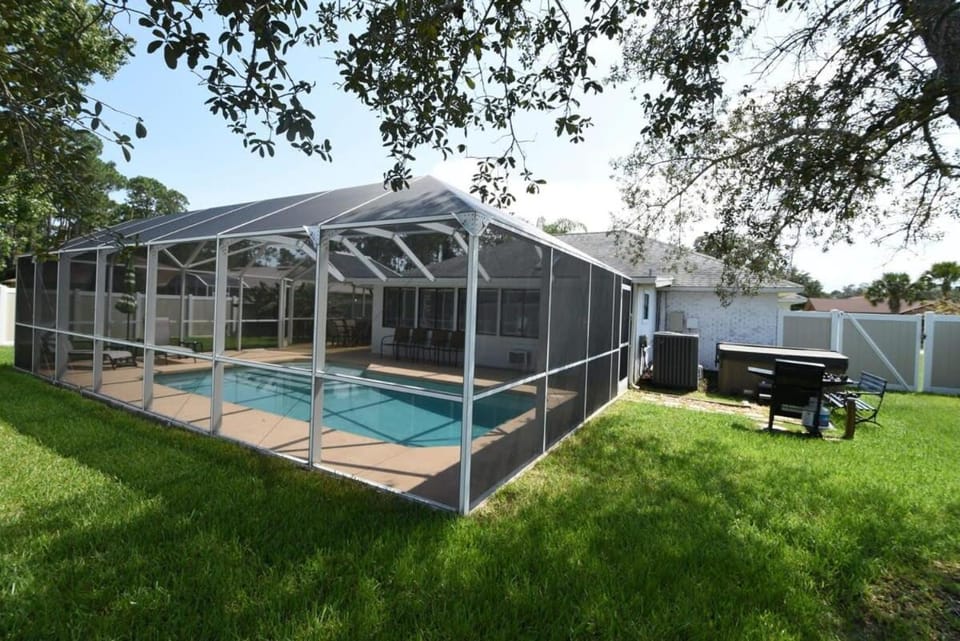 Stunning Fenced Home with Heated Pool & Hot Tub House in Palm Coast