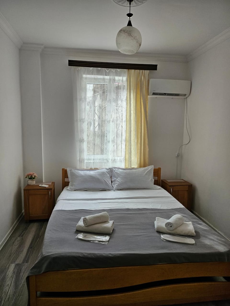 Bed, Photo of the whole room, Bedroom, towels, air conditioner