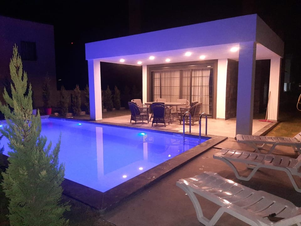 Night, Pool view, Swimming pool, sunbed