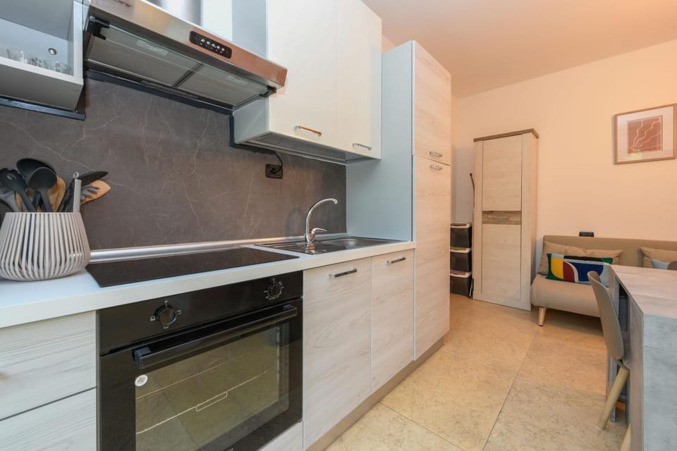Kitchen or kitchenette, oven, stove