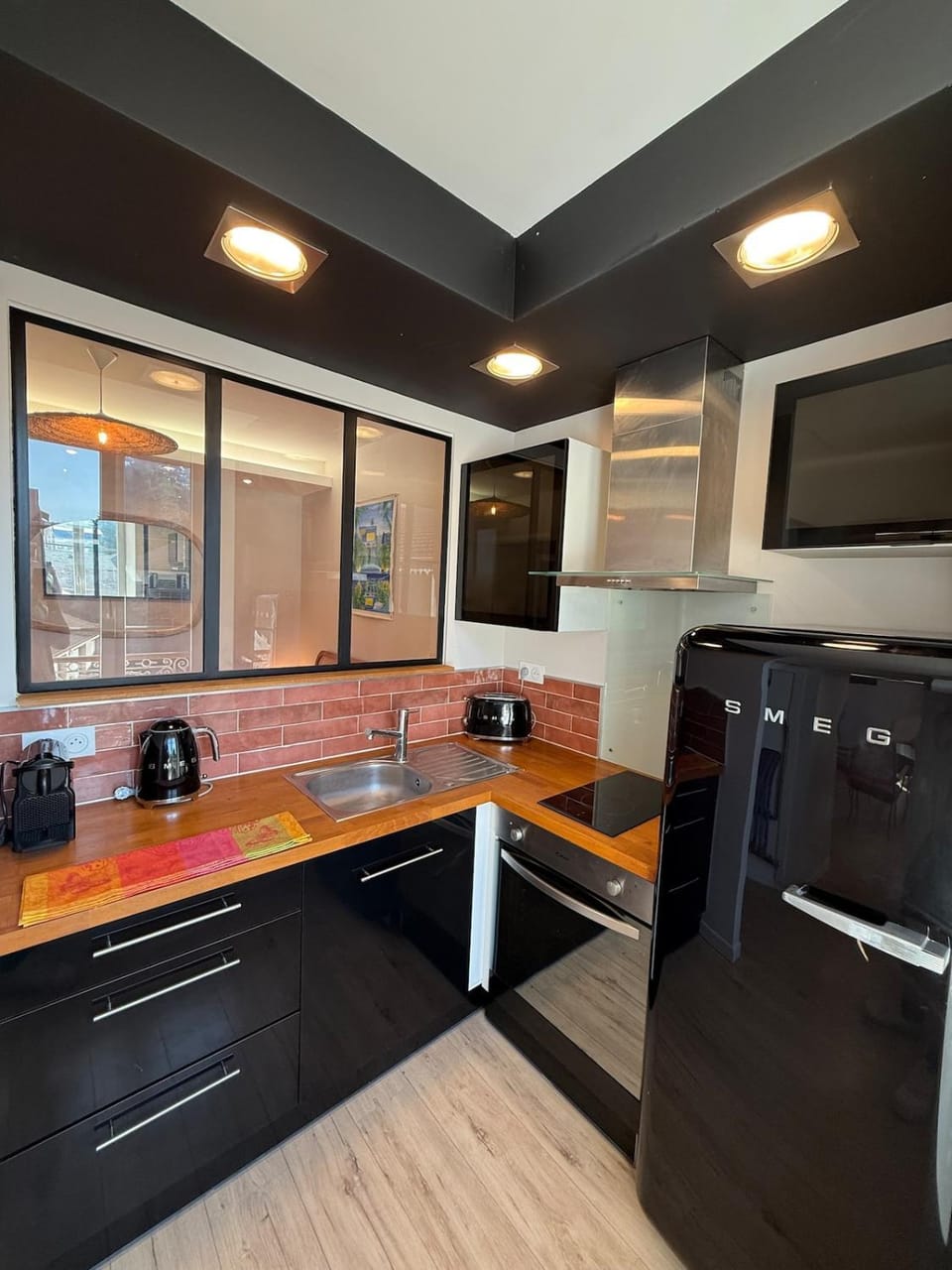 Kitchen or kitchenette, oven, stove, toaster