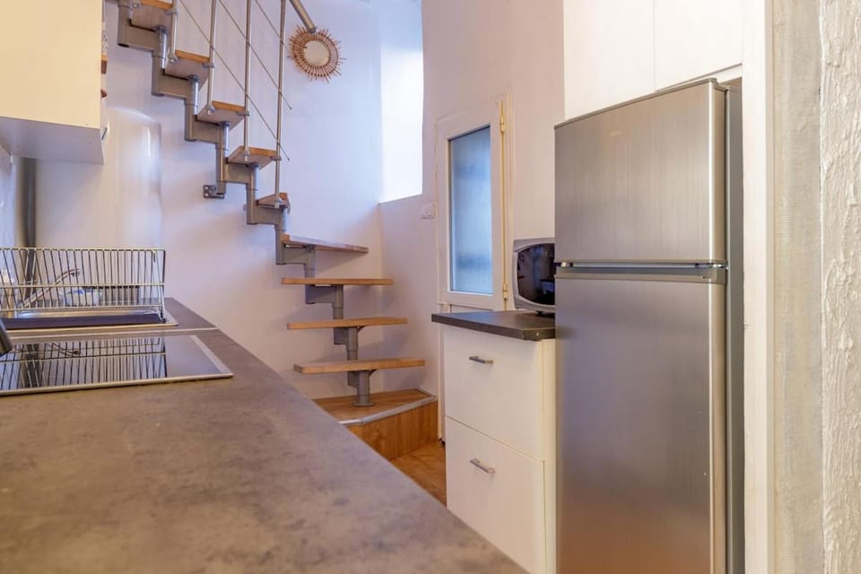Kitchen or kitchenette, stove