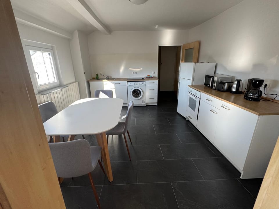 Kitchen or kitchenette, Dining area, stove, toaster