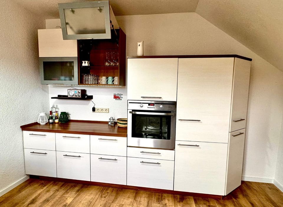 Kitchen or kitchenette, oven
