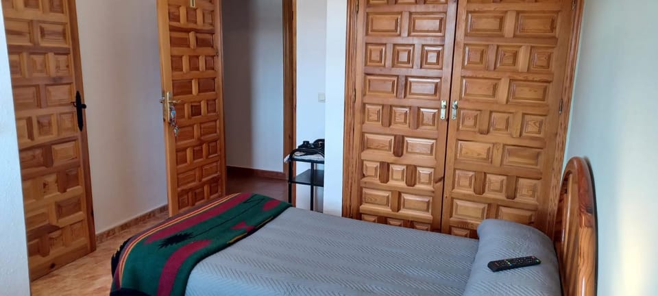 Bed, wardrobe