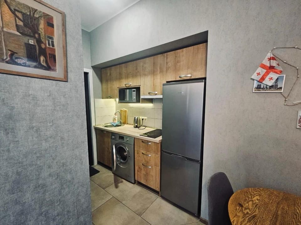 Living room, microwave, stove, stove, washing machine, washing machine, kitchen, kitchen
