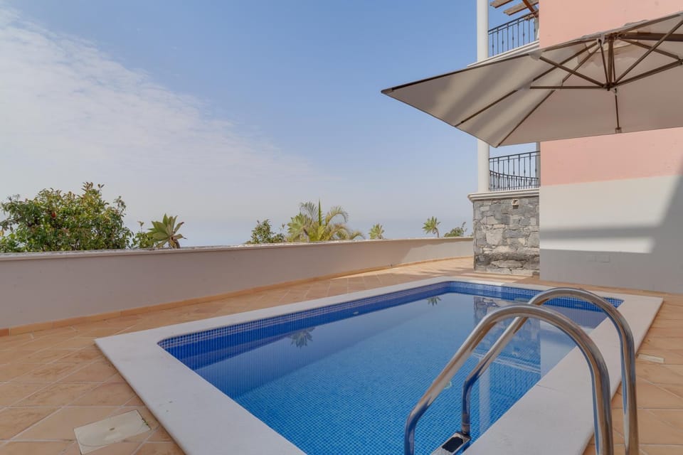 Patio, Day, Pool view, Swimming pool, sunbed