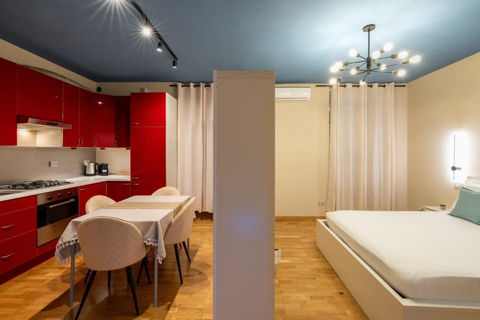 Bed, Kitchen or kitchenette, Living room, Seating area, Dining area, Bedroom