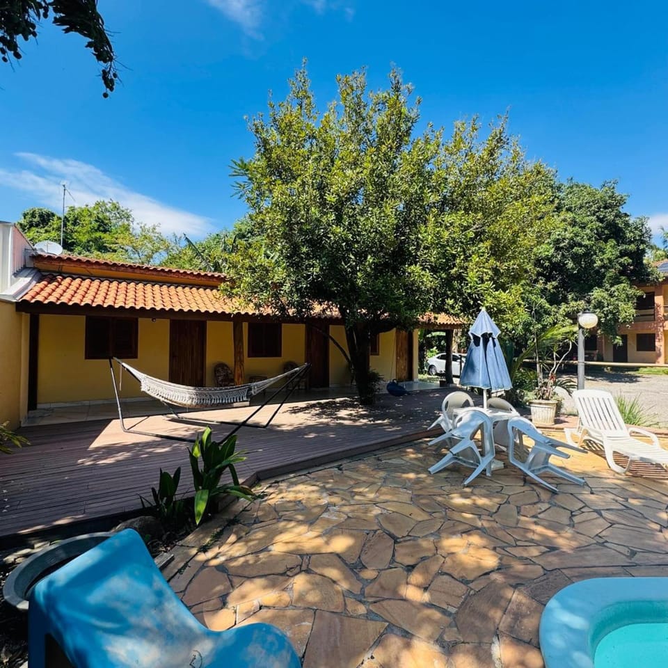 Property building, Patio, Day, Garden, Garden view, Pool view, Swimming pool, sunbed
