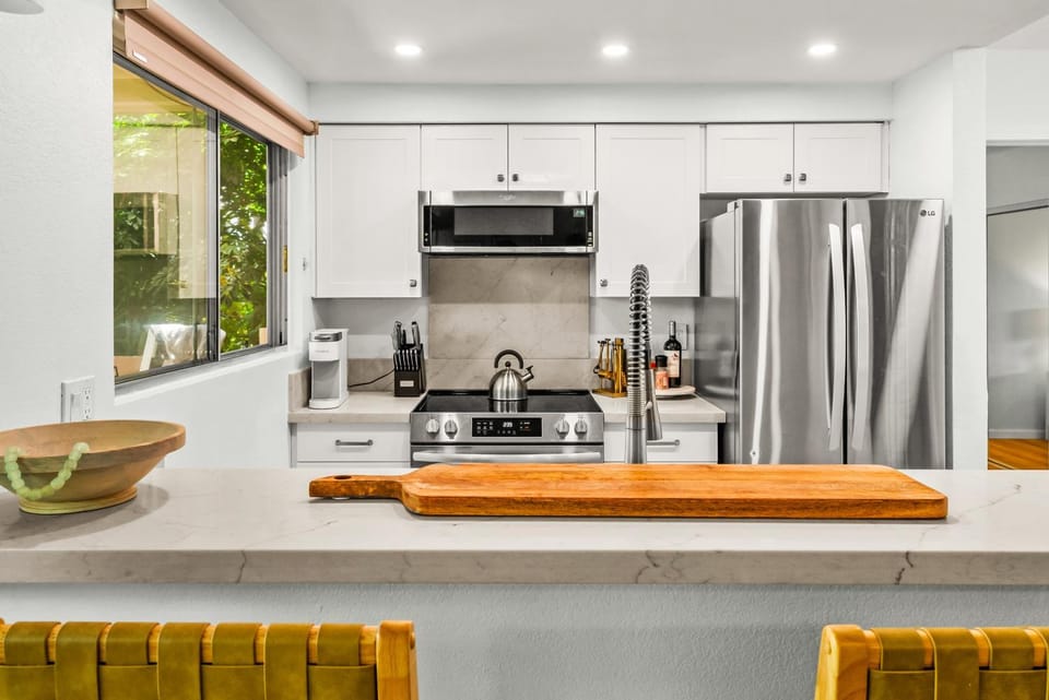Kitchen or kitchenette, dishwasher, oven, stove, toaster