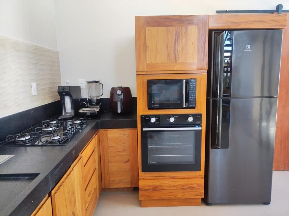 Kitchen or kitchenette, oven, stove