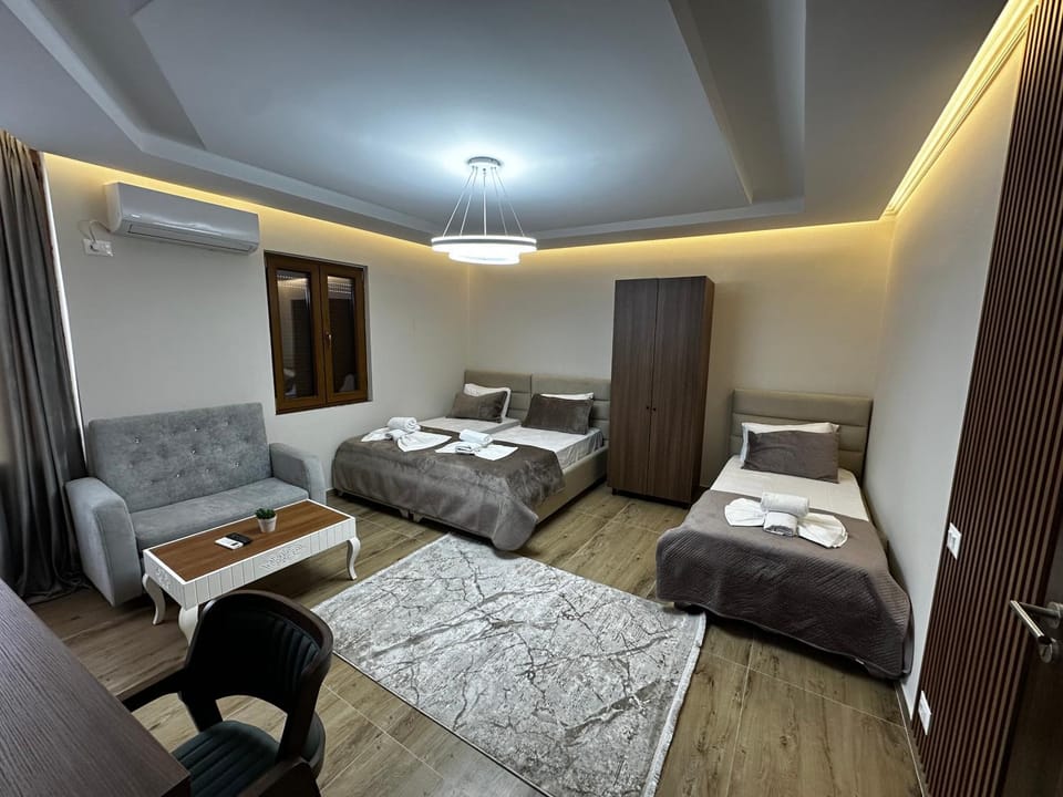 Bed, Photo of the whole room, Seating area, Bedroom, towels, wardrobe
