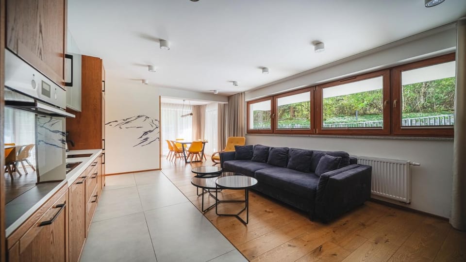 Kitchen or kitchenette, Living room, Seating area, Dining area
