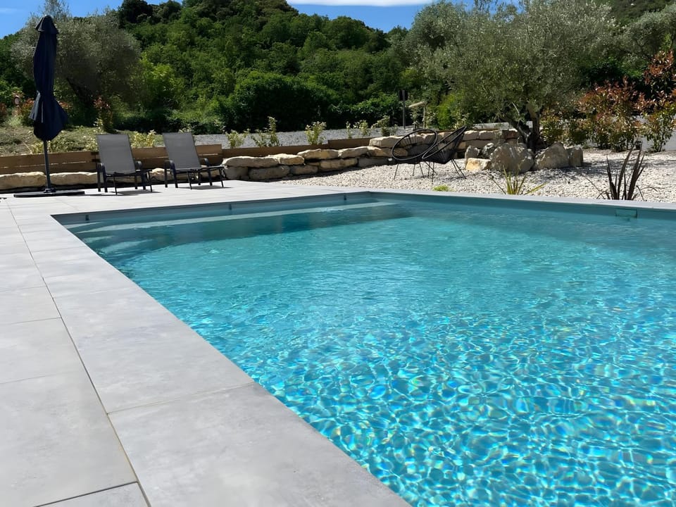 Property building, Living room, Swimming pool