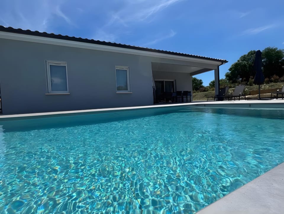 Property building, Living room, Swimming pool