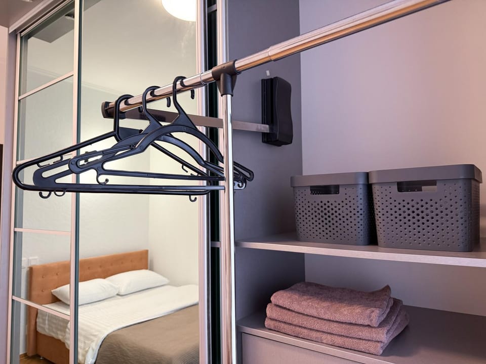 flat iron, towels, wardrobe