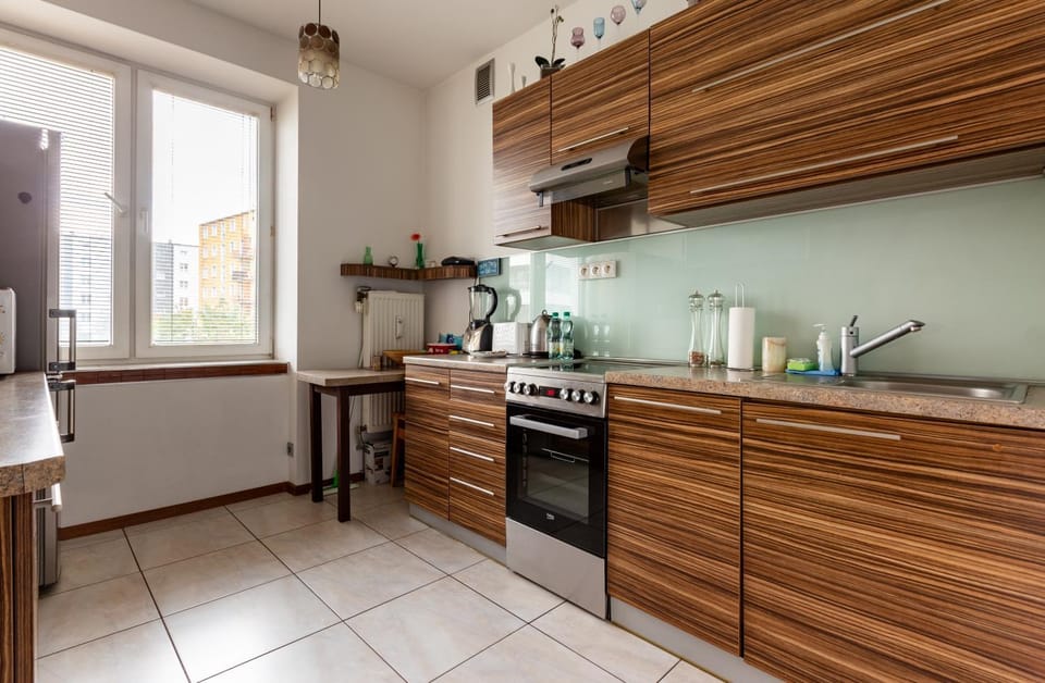 Kitchen or kitchenette, dishwasher, oven, stove