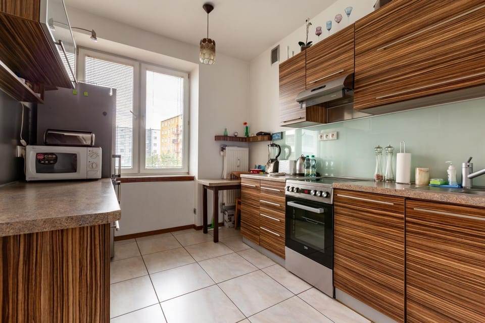 Kitchen or kitchenette, dishwasher, oven, stove, toaster