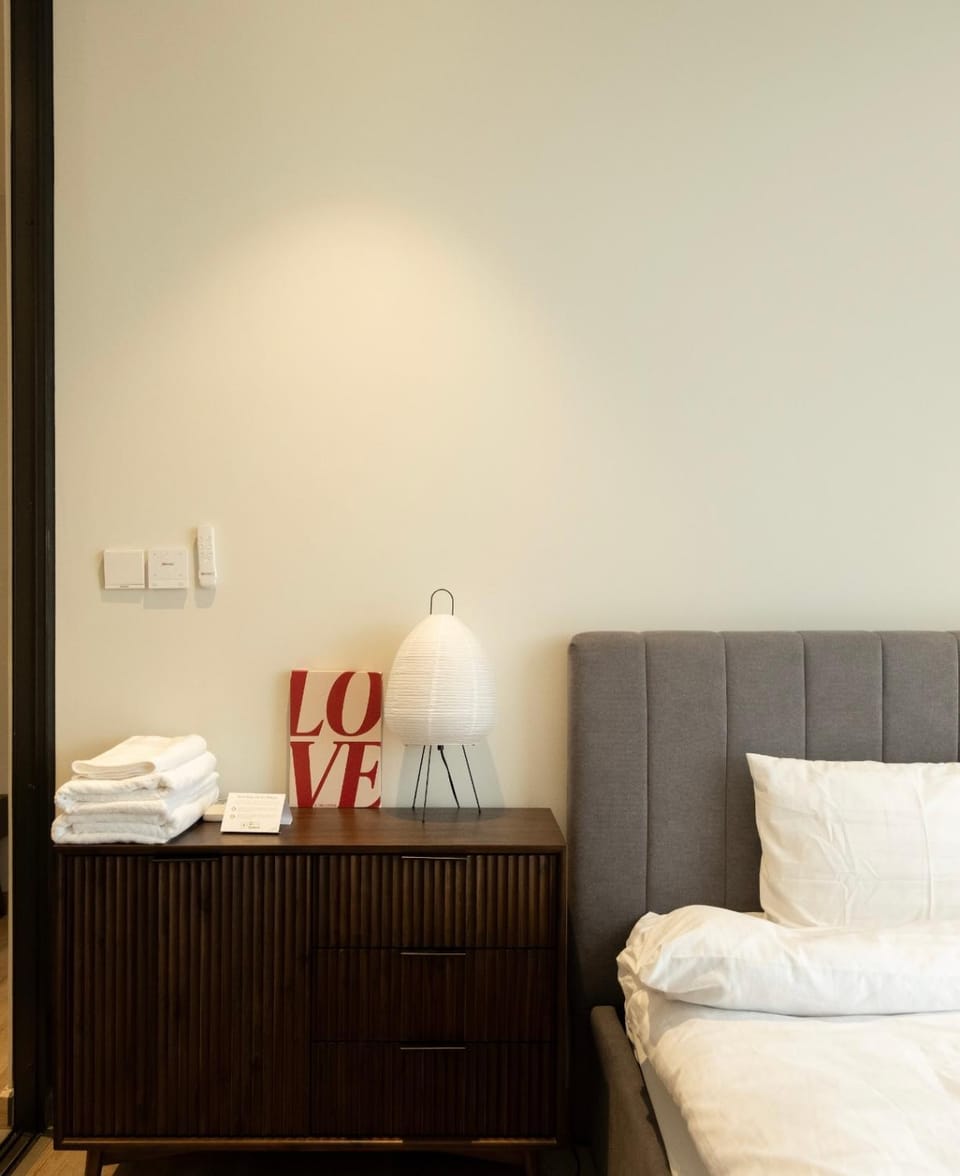 Trầm Room Calm & Dark Wood Apartment in Vietnam