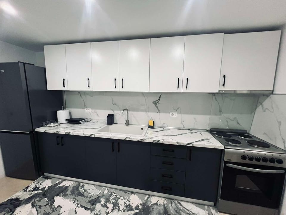 Kitchen or kitchenette, oven, stove