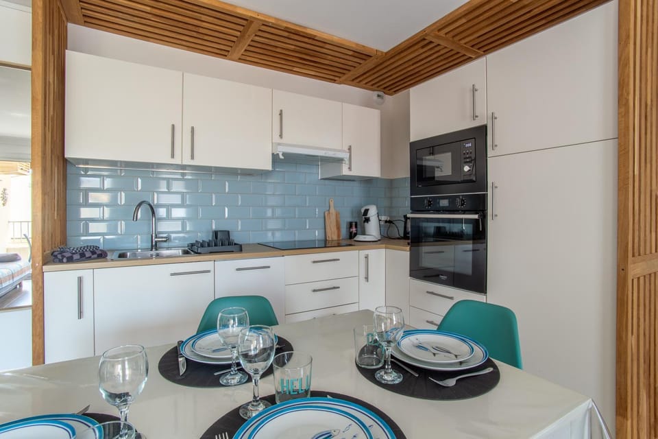 Dining area, dishwasher, oven, stove, kitchen