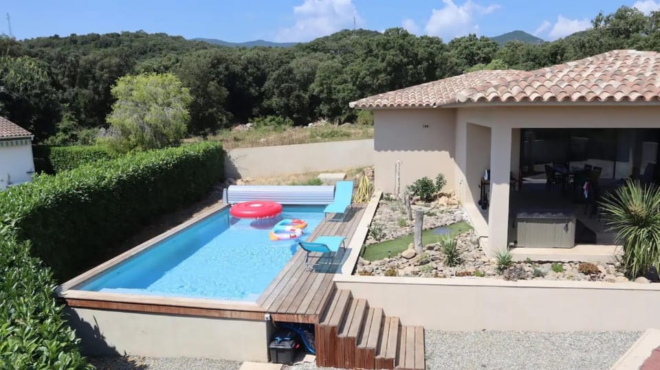 Property building, Living room, Swimming pool