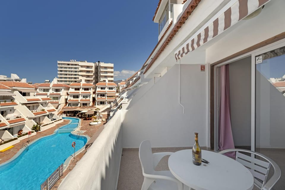 Property building, Living room, Swimming pool